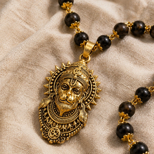 Gold Hanuman pendant detail