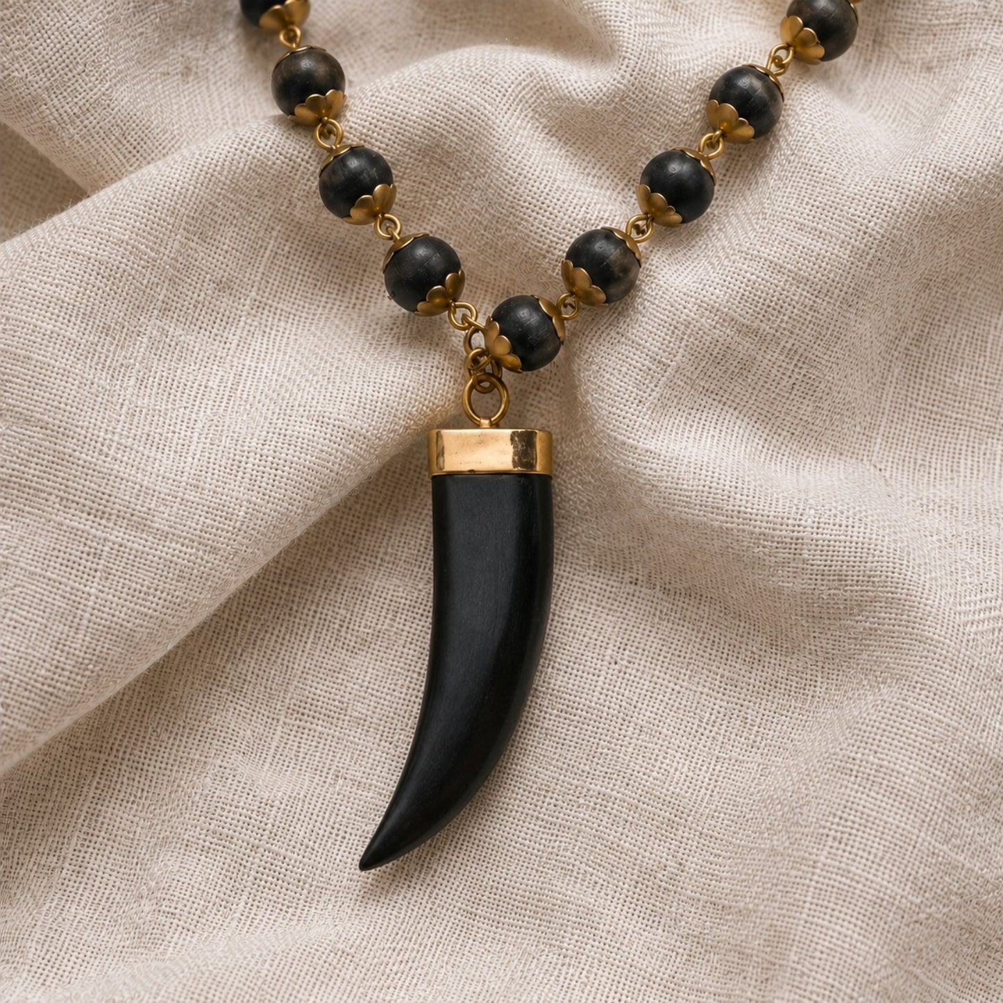 Tiger Tooth design pendant detail