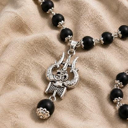 Silver Om Trishul pendant detail
