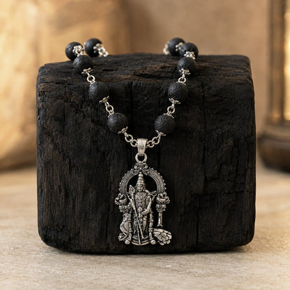 Silver Subramanya Karungali Mala on dark wood