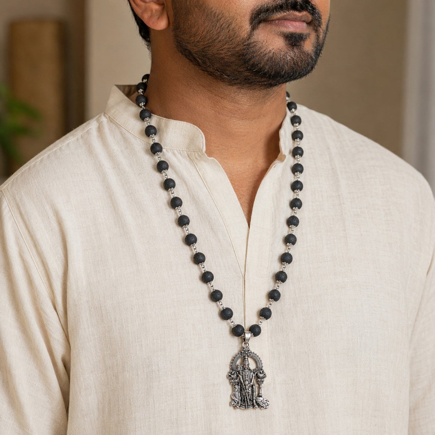 Silver Subramanya Karungali Mala worn by a model